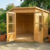A wooden Standard Corner Summerhouse with the central double doors open showing the left side of the interior
