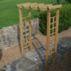 A contemporary wooden Avon Garden Arch product situated in a garden and placed between a slabbed walkway
