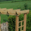 A close up image of the flat top of the wooden Avon Garden Arch product