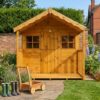 Rutland Sheds standard playhouse for children in natural timber, shown in a garden setting